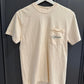Ivory t-shirt with 'Haven' logo on a dark background